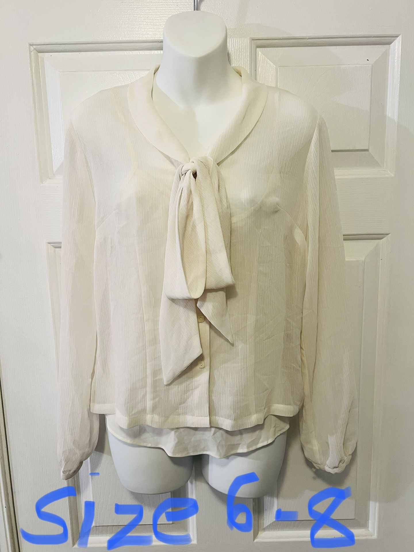 Very beautiful women Shirt size (6-8)only $7