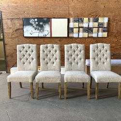 A set of 4 dining chairs.