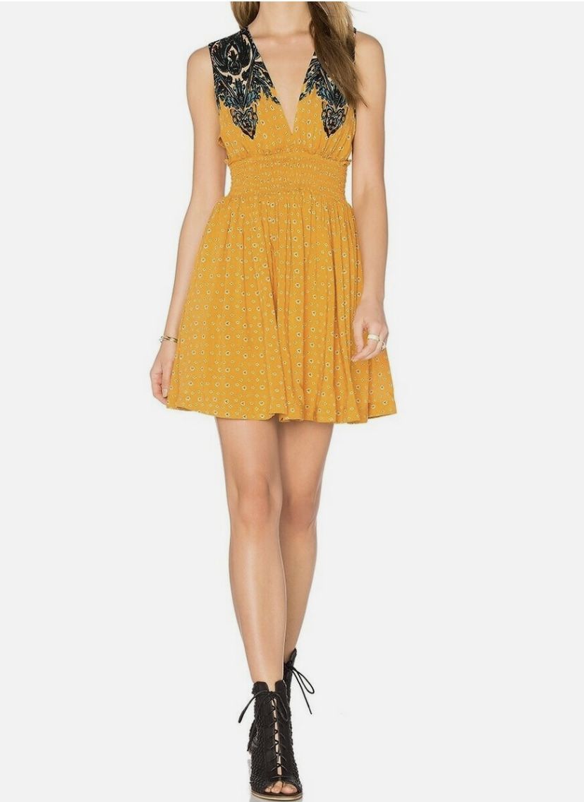 Brand new woman’s Free People brand golden yellow “walking through my dream” dress up for sale