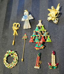 Vtg. Lot of 8 Christmas Broochs Gerry's,  Avon, Coro, LC & Giusto Rare Find!