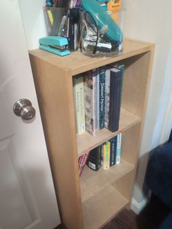 Light wooden bookshelves
