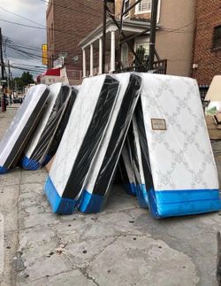 Mattresses in Plastic Wrap