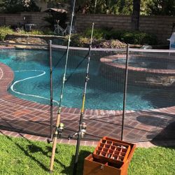 Two (2) 8’ Spinning Rods With Reels & Wood Tackle Box with Lures,Hooks,Sinkers Ect