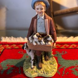 ADORNO DE PORCELANA BISCUIT DISEÑO HOMBRE CON PERROS