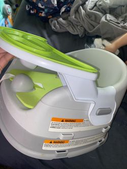 Infant into feeding booster with tray