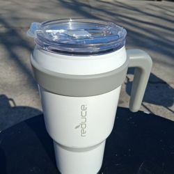 The cup is new, but has a defect on the lid.