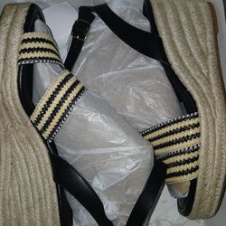 Brand new wickered heeled sandals for women. Size 10