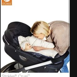 Stokke crusi carricott in excellent condition. Exactly like in the picture navy color. Paid 400. Selling for 220.  For Stokke Stroller 