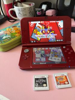 Used *new* 3DS XL with games downloaded and cartridges Pokémon Sun and Kingdom Hearts
