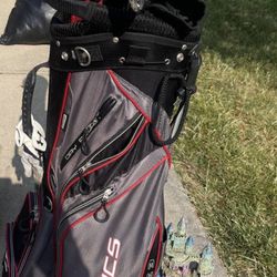 Cleveland driver, tour edge irons, and a Titleist 56