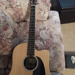 Martin acoustic electric cutaway, discontinued model w/ accessories & recent setup.