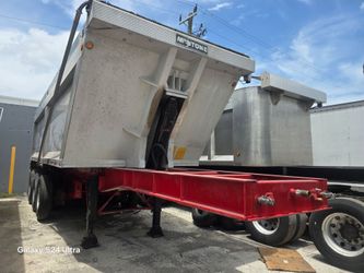 2003 MONTONE 28 FT CHASSIS 24 FT ALUMINUM END DUMP TRI-AXLE TRAILER
A
