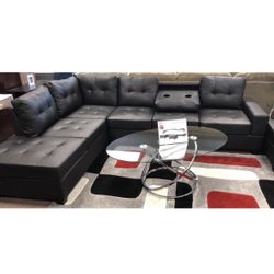 Heights Black Faux Leather Reversible Sectional with Storage Ottoman 