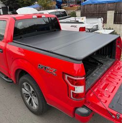 Tapas Duras. 2004 to 2026 Ford F-150 Hard Tri Fold Bed Covers