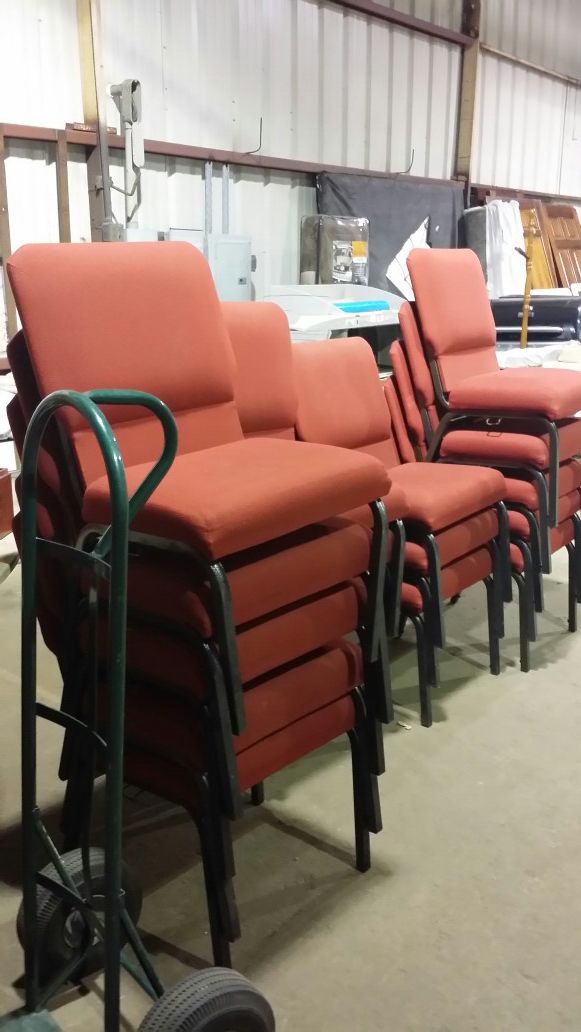 35 stackable church chairs $20 each red in color