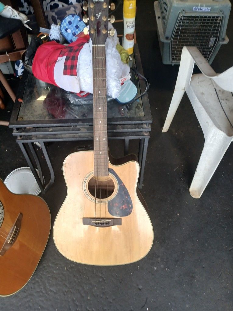 Yamaha guitar needs some work 50.00