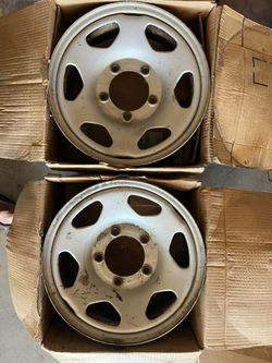 4 geo tracker stock rims - $100 for all 4
