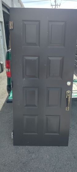 Exterior metal door 8 panel all metal top bottom size corner approximately 36x79