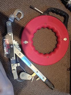 Angle grinder, fish tape, come along