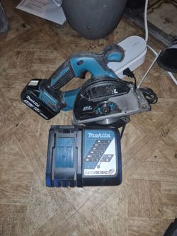 Makita 18v saw + 18v Battery + Charger $65 firm!