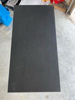Used black entry rug