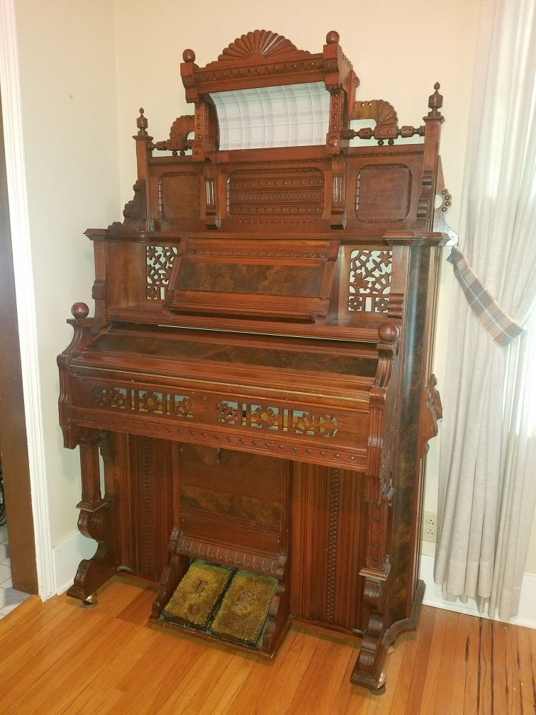 Newman Brothers antique pump organ