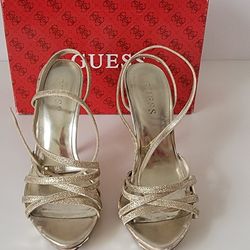 Guess women gold high heels Size 6M