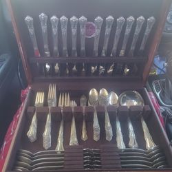 Vintage oneida flatware set (service for 12) inside a felt lined wooden chest