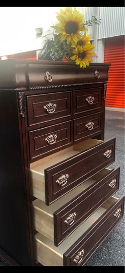Solid wood tall chest  with big drawers.