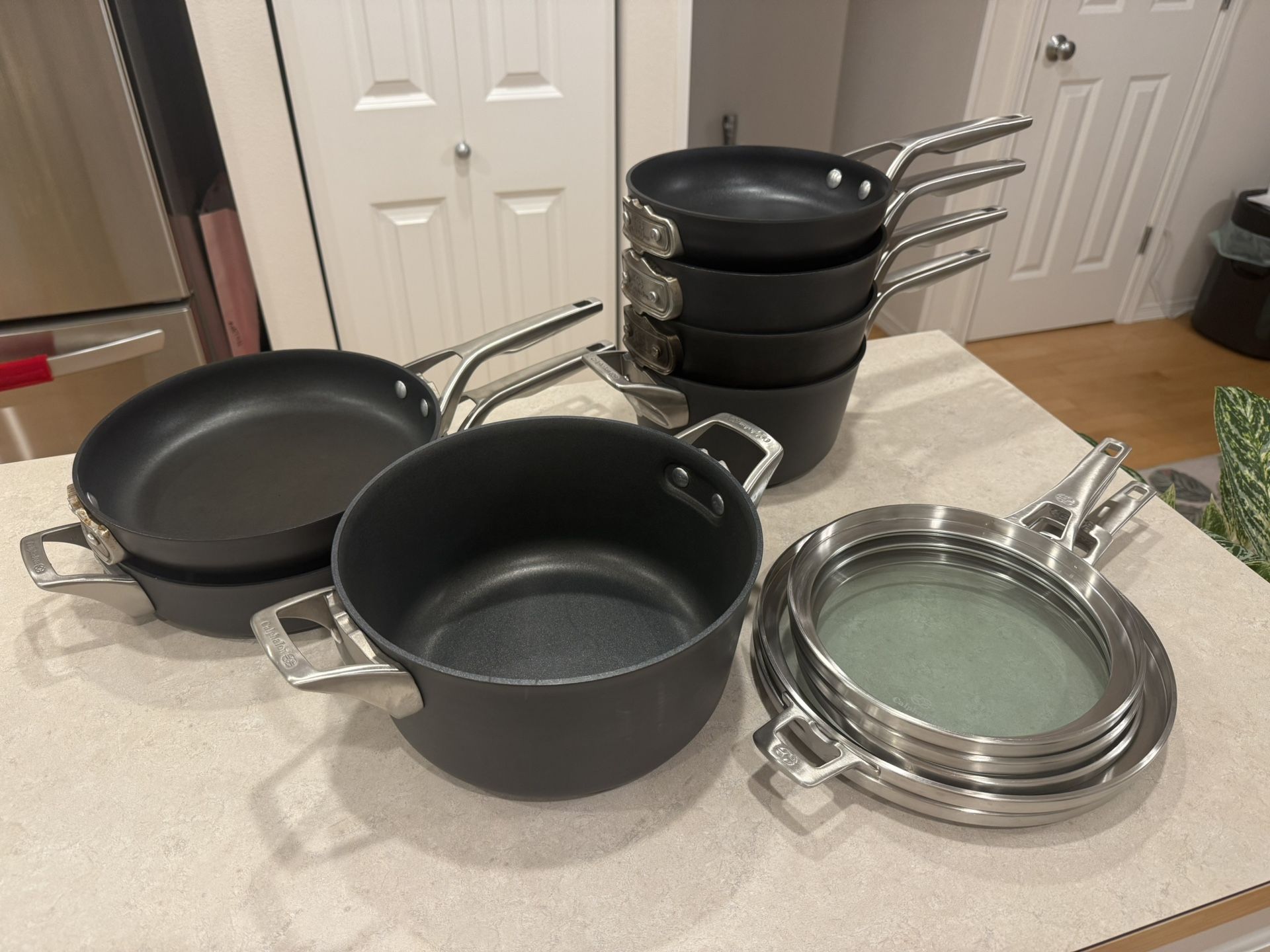 Calphalon Premier™ Space-Saving Hard-Anodized Nonstick Cookware, 10-Piece Pots and Pans Set + 1 Pot/Lid FREE