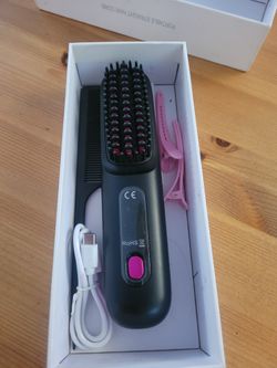 Rechargeable heated hair straightening brush.