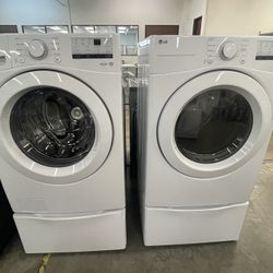 LG Washer And Electric Dryer With Two Pedestals