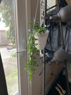 Hanging fake plant with vase