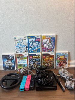 Nintendo Wii Bundle - Console + 3 Controllers + 8 Games + Accessories