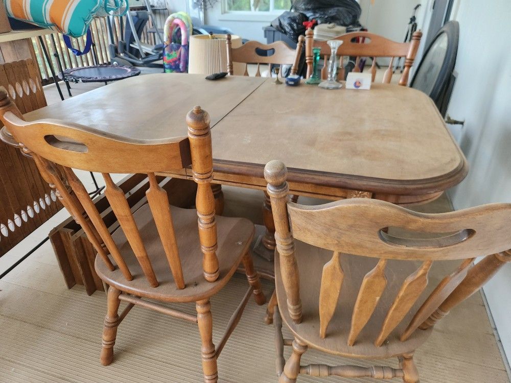 Table And Mismatched Chairs