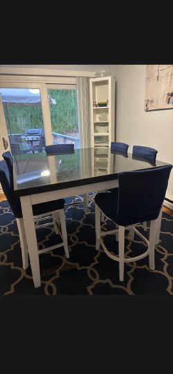 Granite table top with 6 chairs