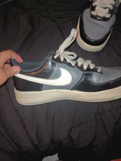Gray and black Nike Air Force 1s size 8.3