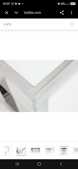 Mid century modern polished steel and white top console