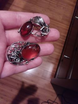 Amber and silver brooch pins