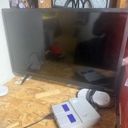 Physio 24 Inch Tv With Vintage Super Nintendo Game
