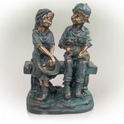 Reduced - Tall Indoor/Outdoor Girl and Boy Sitting on Bench with Puppy Statue Yard Art Decoration