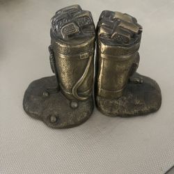 Pair of vintage golf bag bookends.