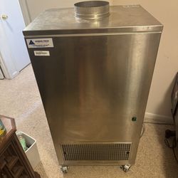 Air scrubber for pathogens like measles