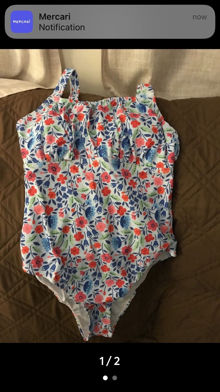 New One Piece Size Small 4-6