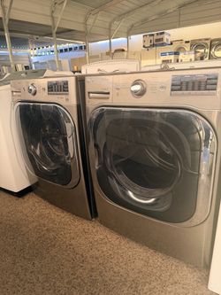 Lg front load 5.0 cu ft washer and gas dryer set