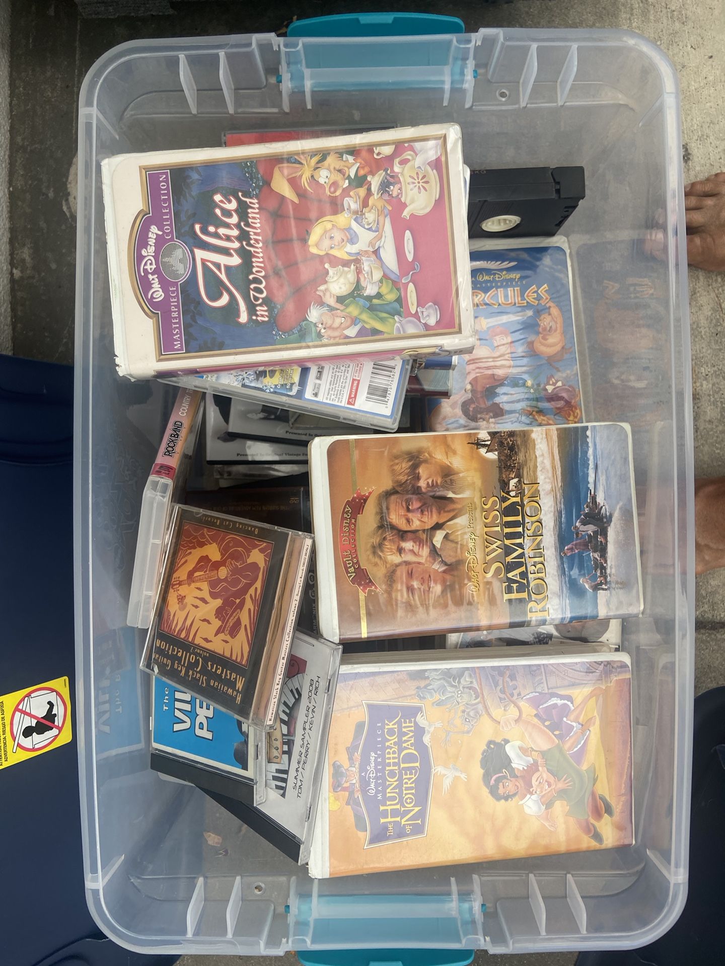 VHS tapes, DVDs, Blu-ray, PlayStation games rock band games