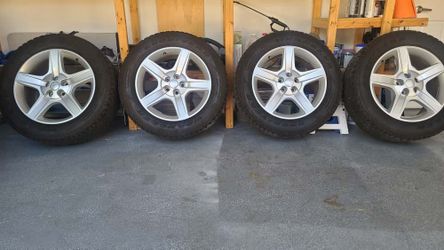 4 Goodyear tires & Rims w/ Land Rover Center Caps