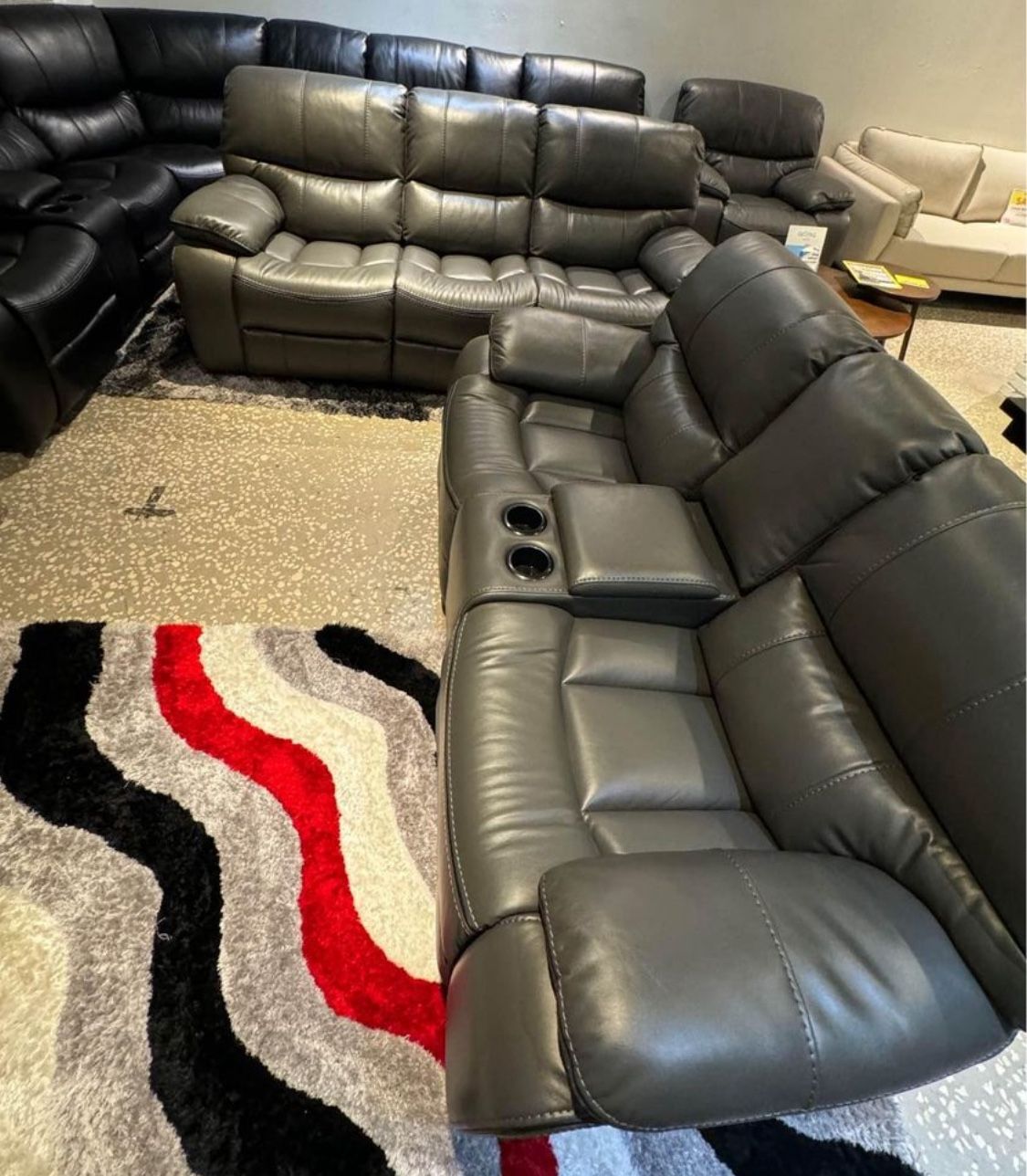 Fourth of July sale. Madrid, gray leather reclining sofa and loveseat set now $1199. Easy finance option. Same day delivery.