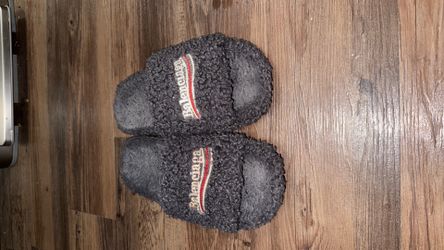 Beat up Balenciaga slides