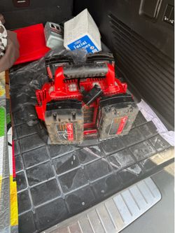 Milwaukee charger and 4 batteries